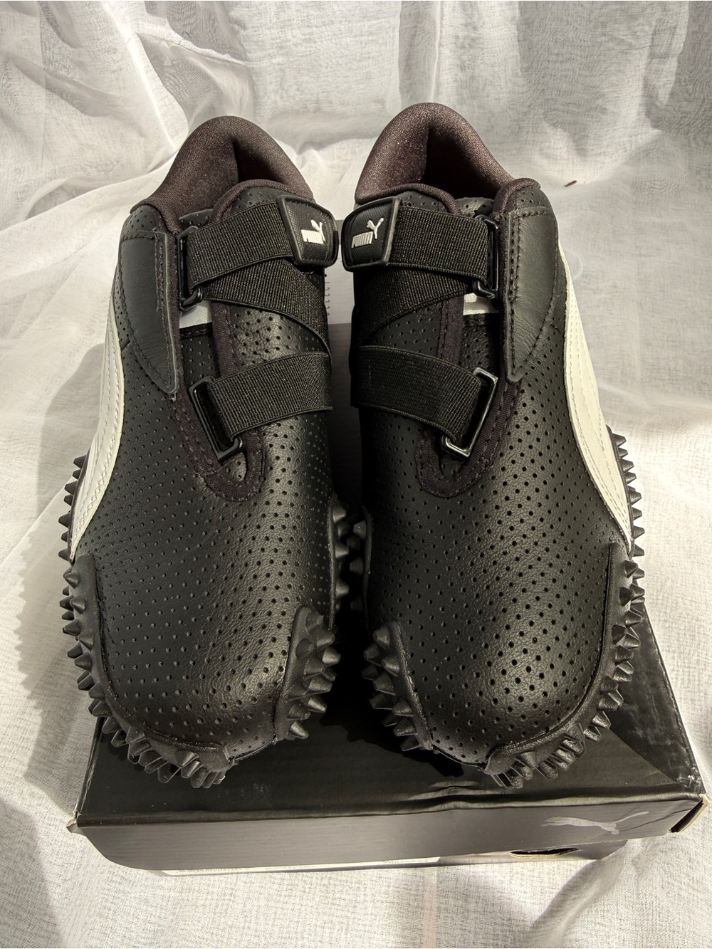 Puma Men’s Black and White Perforated Spike-Soled Sneakers